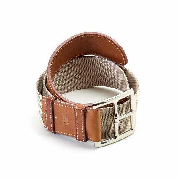 Hermes : Cintura Hermès Etriviere tela e pelle con dustbag  - Asta GIOIELLI OROLOGI E LUXURY GOODS - Faraone Casa d'Aste
