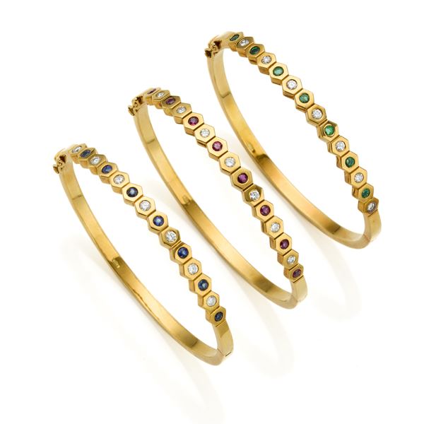 Tre bracciali Spallanzani in oro con diamanti, rubini, smeraldi e zaffiri