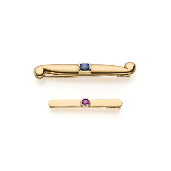 Two gold brooches with sapphire and ruby