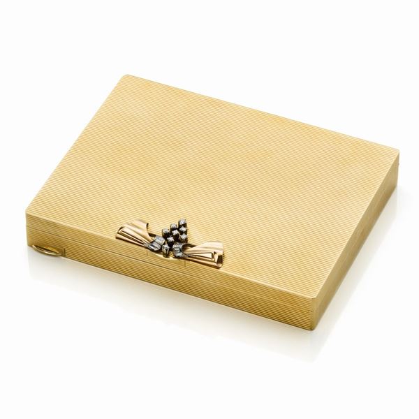 Necessaire in oro con diamanti 