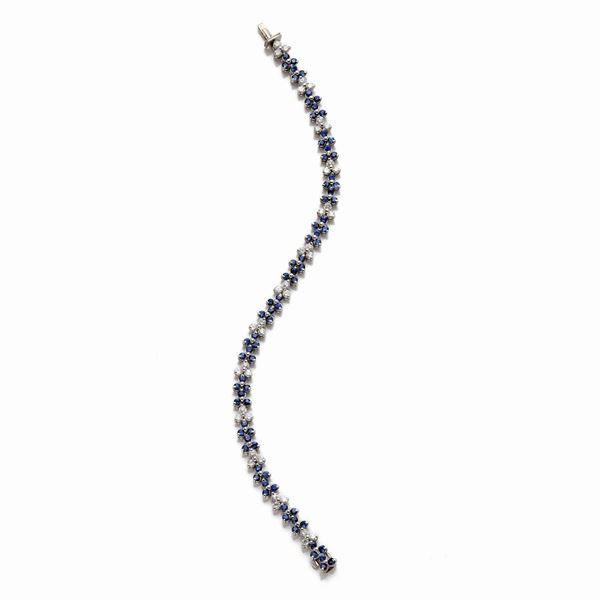 Bracciale in oro con diamanti e zaffiri 