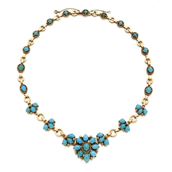 Gold necklace with turquoises