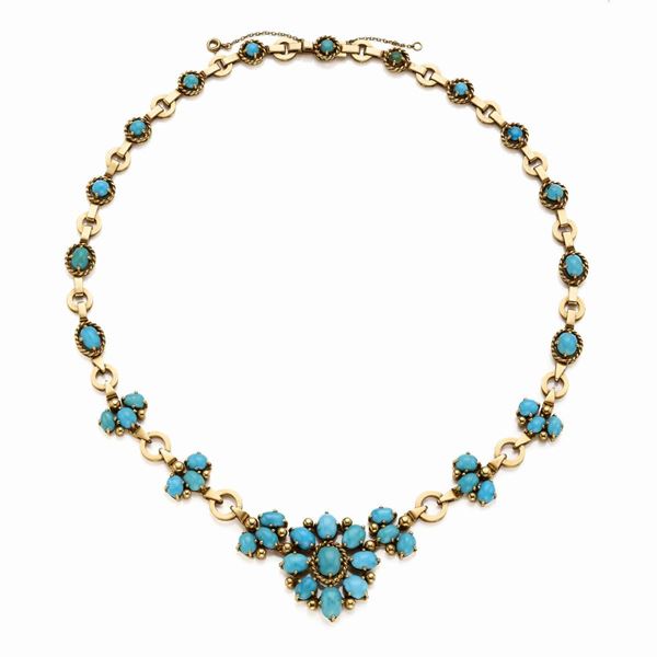 Collier in oro e turchesi