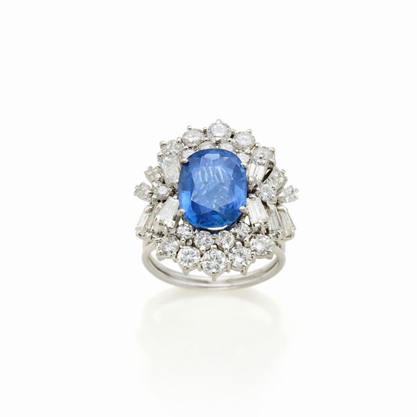 Anello oro bianco zaffiro e diamanti