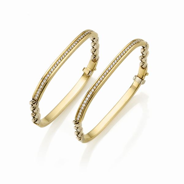 Pair of Spallanzani gold bracelets with diamonds  