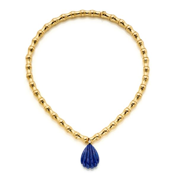 Gold necklace with lapis and diamond pendant