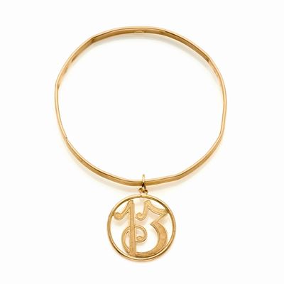 Bangle in Oro Giallo con Charm