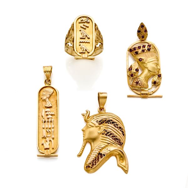 Three pendants and a ring in gold 
