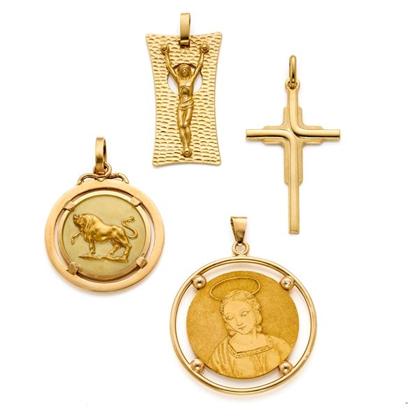 Four gold pendants