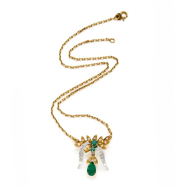 Gold necklace with diamonds and emeralds 