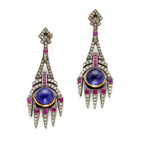 Silver earrings with tanzanites diamonds and rubies