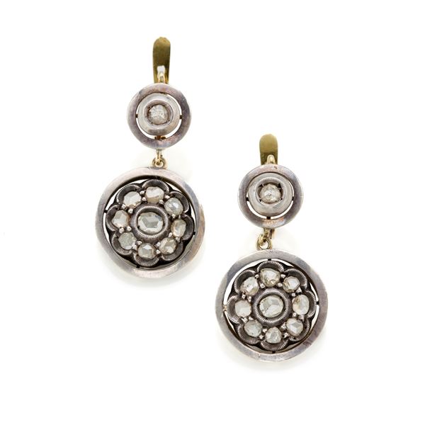 Silver and gold earrings with diamonds 