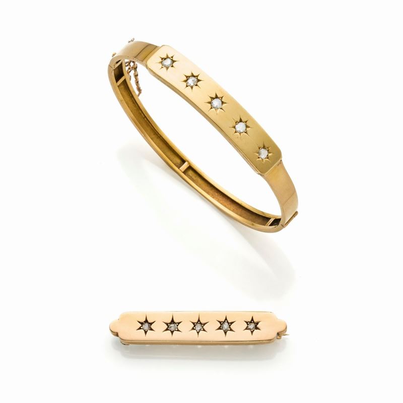 Bracciale e spilla in oro e diamanti