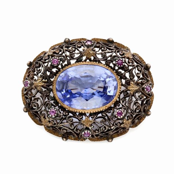 Spilla in argento e oro con zaffiro sintetico  - Asta GIOIELLI, OROLOGI E LUXURY GOODS - Faraone Casa d'Aste