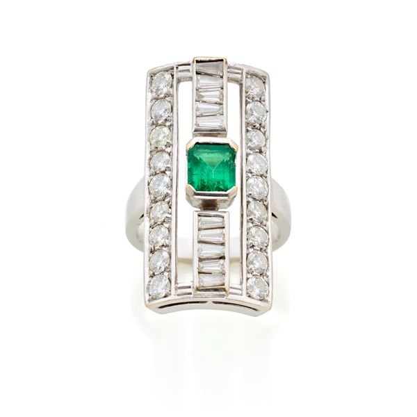 Gold ring with diamonds and emerald 