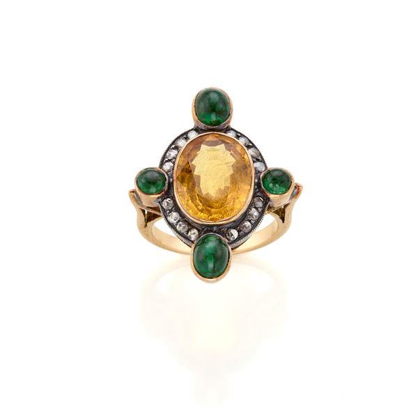 Gold and silver ring with emeralds and diamonds 