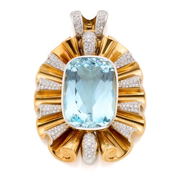 Gold pendant with diamonds and topaz 