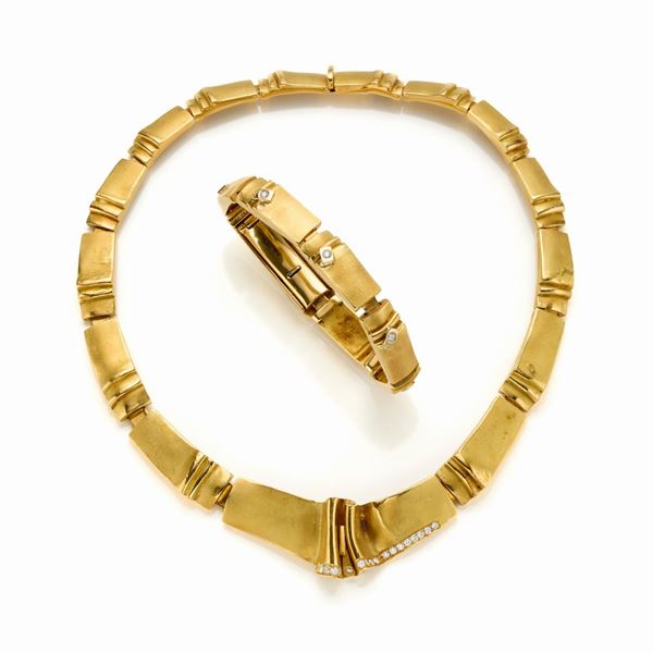 Demi parure Misani in oro e diamanti 