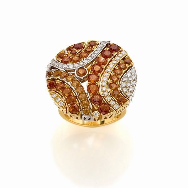 Anello in oro con diamanti e quarzi