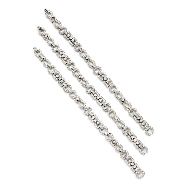 Three platinum and diamond bracelets