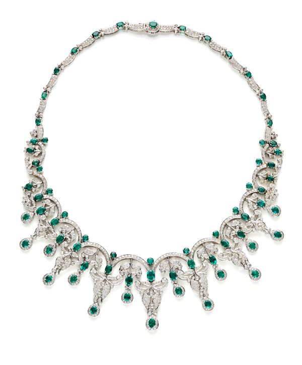 Gold necklace with diamonds and emeralds