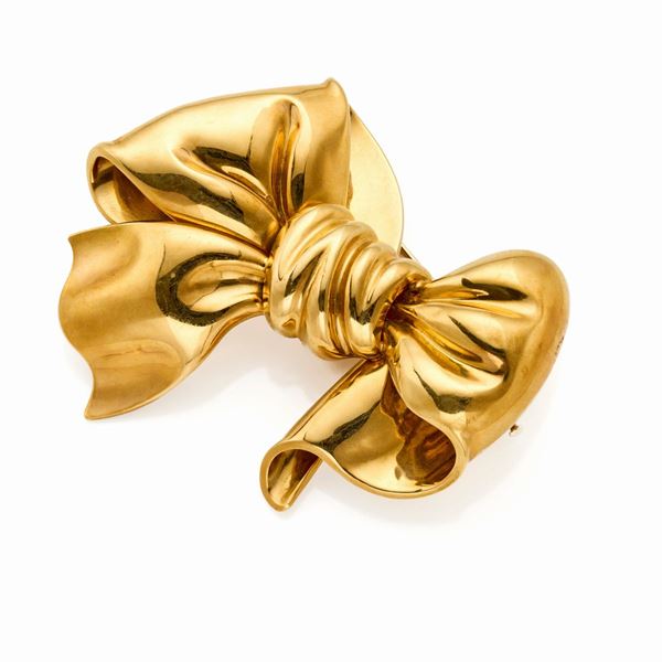 Spilla a fiocco in oro  - Asta GIOIELLI OROLOGI E LUXURY GOODS - Faraone Casa d'Aste