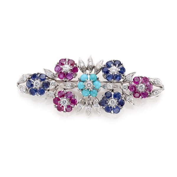 White gold brooch with diamonds, rubies, sapphires and turquoises