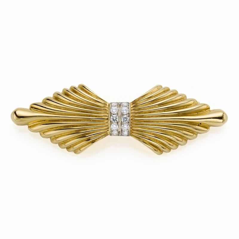 Spilla in oro e diamanti