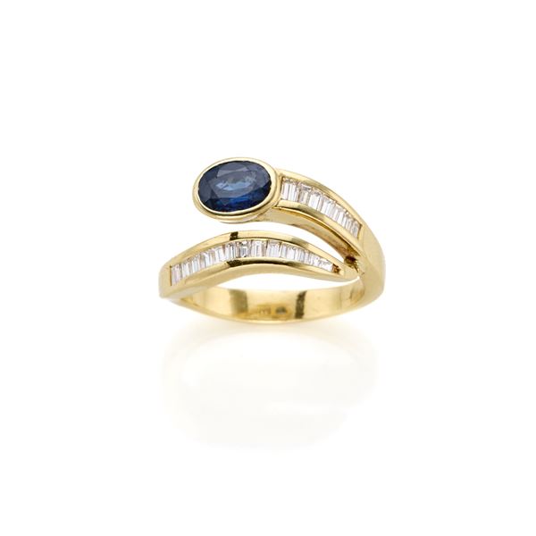 Gold ring with sapphire and diamonds 