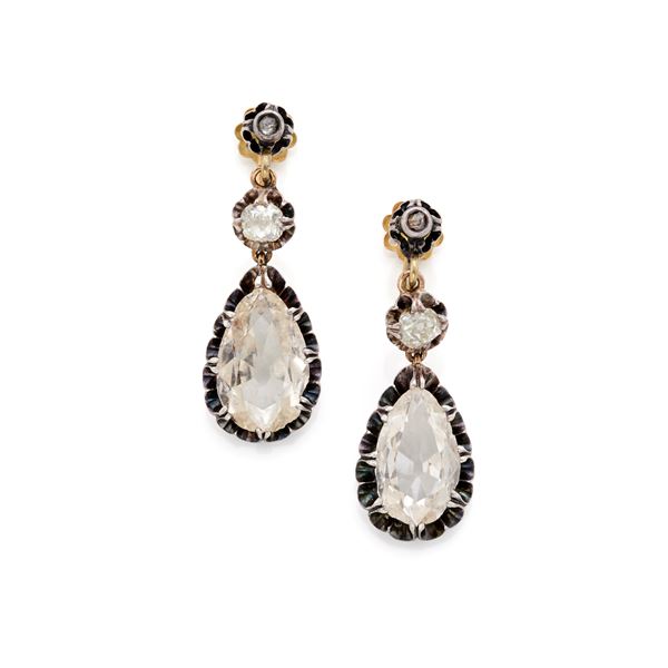 Gold and silver earrings with diamonds