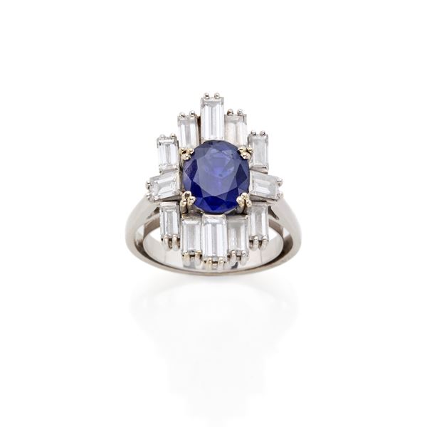 Gold ring with sapphire and diamonds