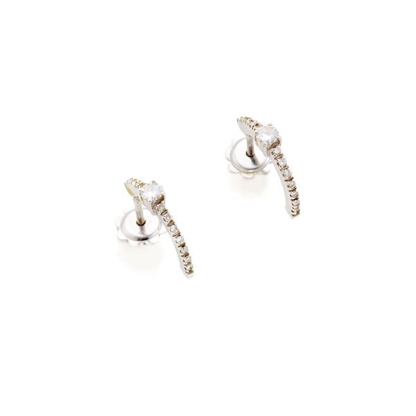 Gold and diamond earrings