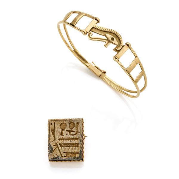 Spilla e bracciale in oro