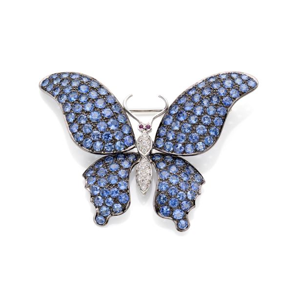 Gold brooch with diamonds and sapphires