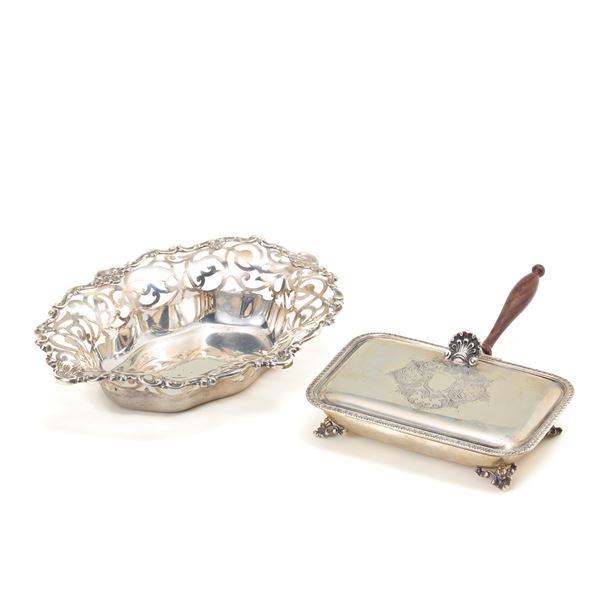 Silver centrepiece and a crumb tray