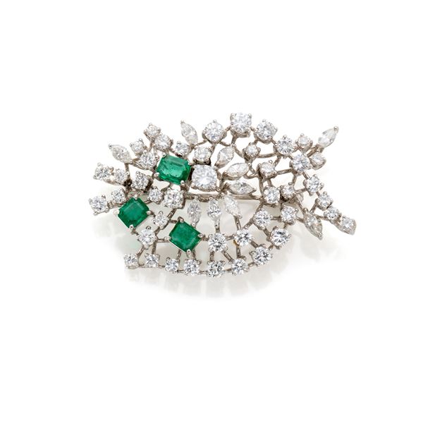 Gold brooch with diamonds and emeralds