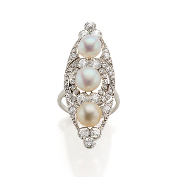 Platinum ring with pearls and diamonds