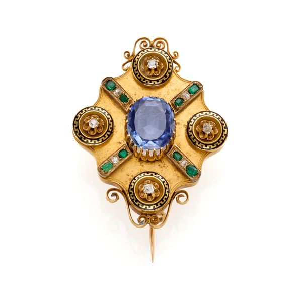 Gold brooch with oval sapphire, diamonds, emeralds and enamel