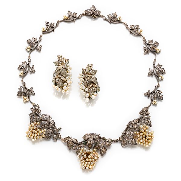 Demi parure in argento con perle e diamanti