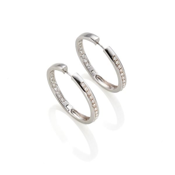 Gold hoop earrings with diamonds