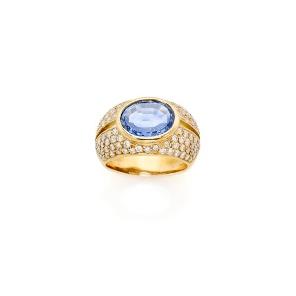 Gold ring with diamonds and sapphire