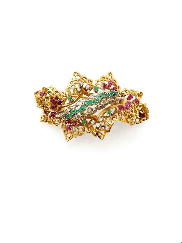 Gold brooch with rubies, emeralds and round diamonds.