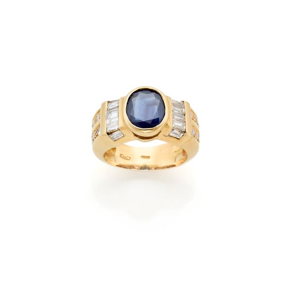 Gold ring with sapphire and diamonds