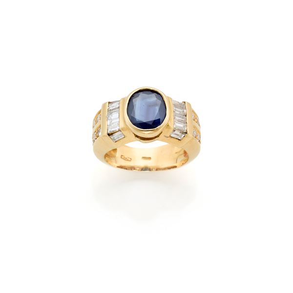 Anello in oro con diamanti e zaffiro