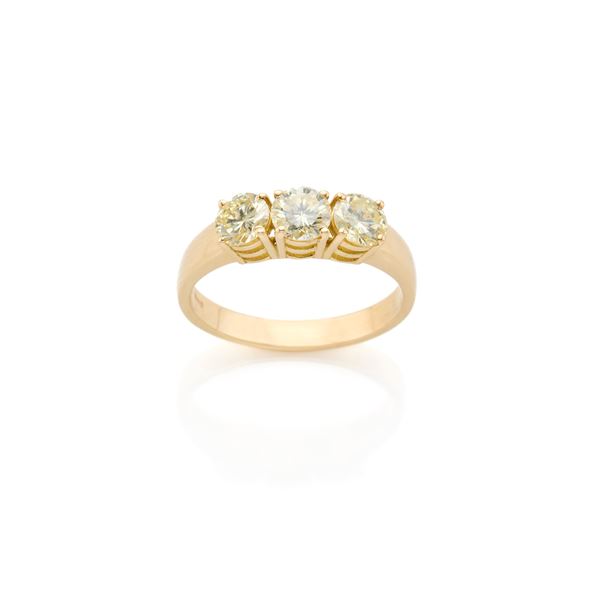 Gold trilogy ring with diamonds