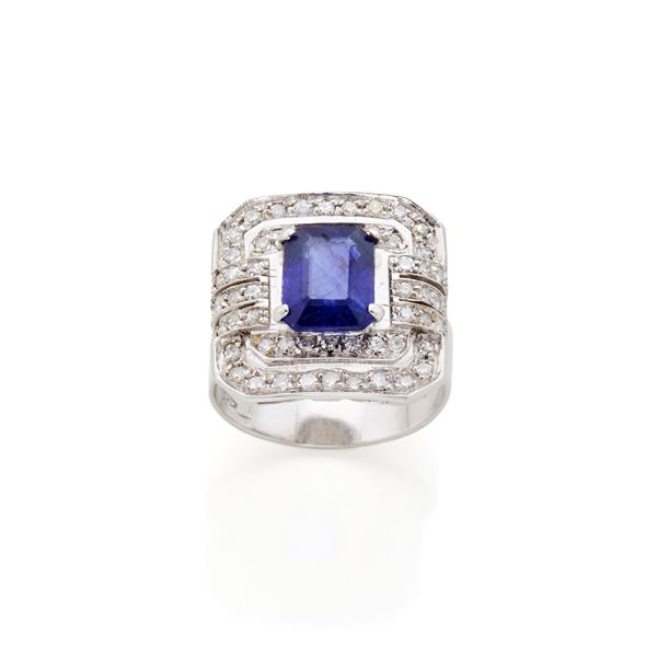 Gold ring with sapphire and diamonds