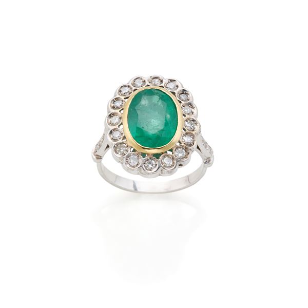 Gold ring with emerald and diamonds