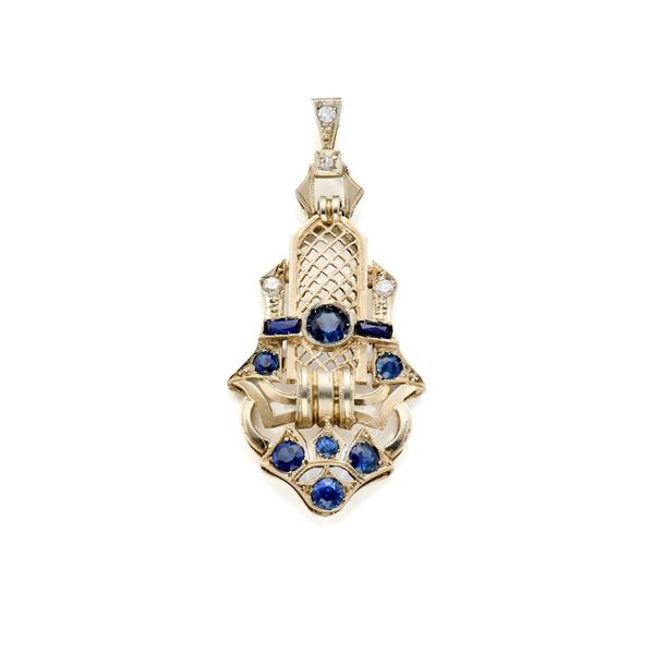 Gold pendant with diamonds and sapphires