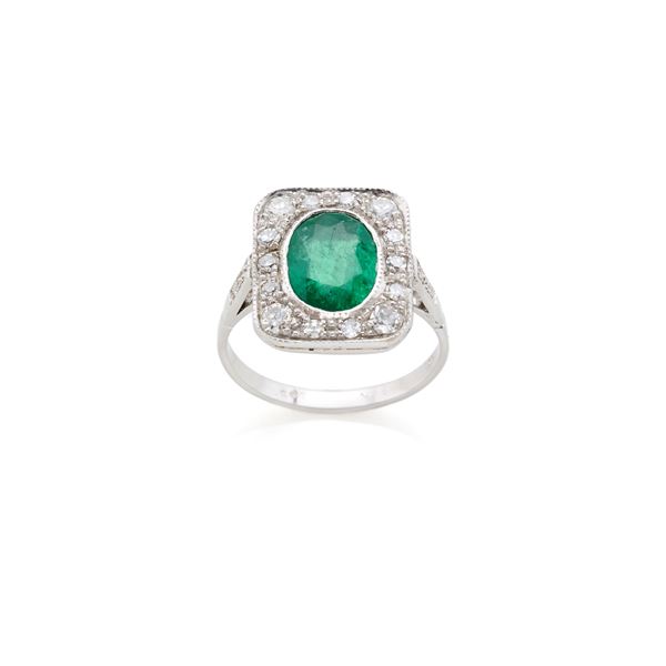 Gold ring with emerald and diamonds