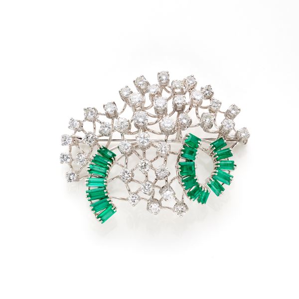 Gold brooch with diamonds and emeralds